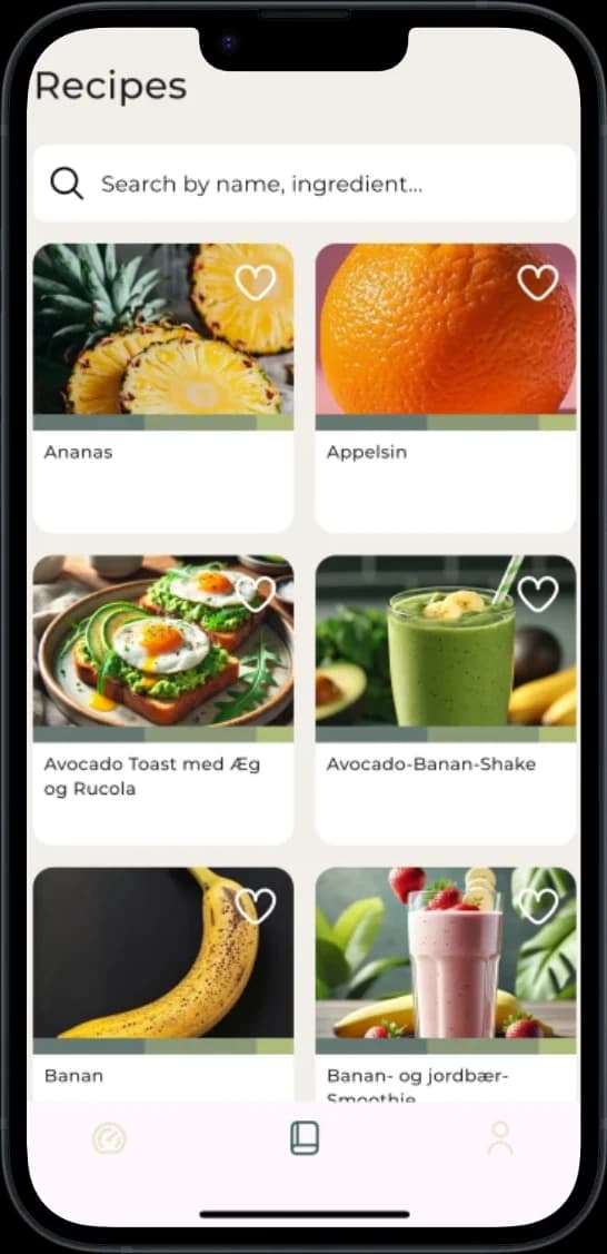 Mobile screen showing the recipe database in the Carboplanner app. The interface displays a search bar labeled “Search by name, ingredient...” and a grid of recipe cards with images and titles. Recipes shown include Pineapple, Orange, Avocado Toast with Egg and Arugula, Avocado-Banana Shake, Banana, and Banana-Strawberry Smoothie. Each card has a heart icon to mark favorites.